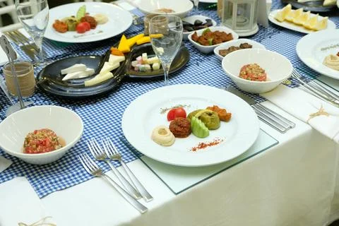 A table lined with appetizers for ouzo Stock Photos