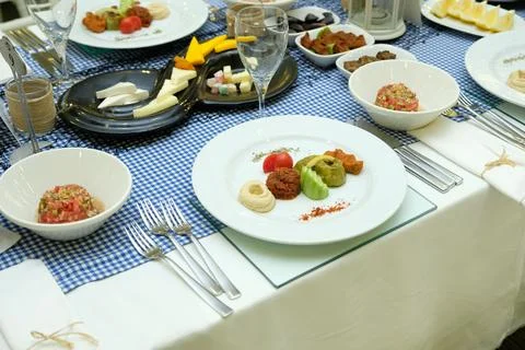 A table lined with appetizers for raki Stock Photos