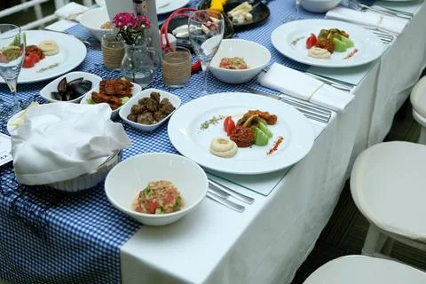 A table lined with appetizers for turkish raki Stock Photos