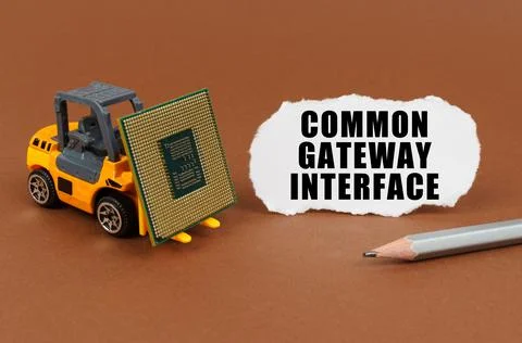 On the table, the loader transports the processor, next to it is paper with t Foto stock