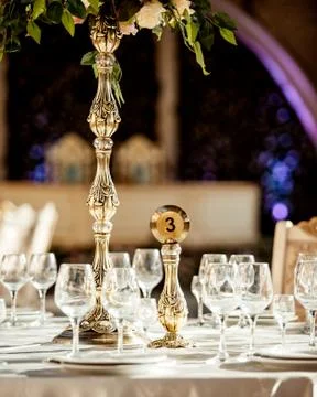 A table with lots of wineglasses Stock Photos