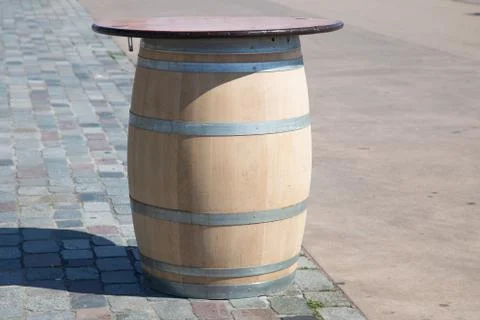 Table made with a wine barrel Stock Photos