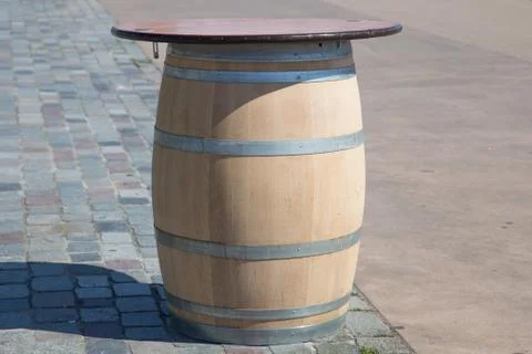 Table made with a wine barrel Stock Photos