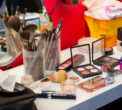 Table with make up accessories Stock Photos