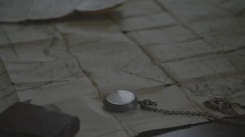 Table with Map, Watch and Glasses Stock Footage 54282940