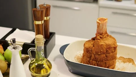 On the table, meat is accompanied by fresh fruit and a varied selection of Stock Footage 270504524