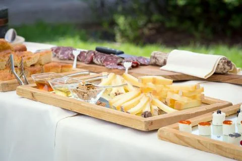 Table of meat and cheese Stock Photos