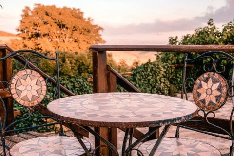 Table with mosaic in the garden Stock Photos