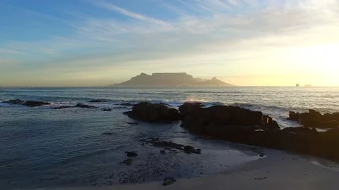 Table Mountain Aerial Shot from Beach at Sunset Stock Footage 79746734
