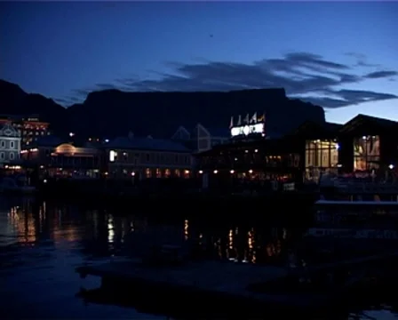 Table Mountain and V&A Waterfront Neon Lights at Night, Cape Town GFSD Stock Footage