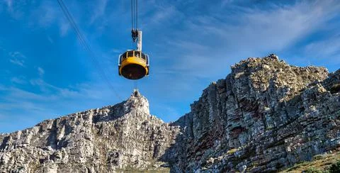 Table mountain cable car with a view towards the top cable way station Stock Photos