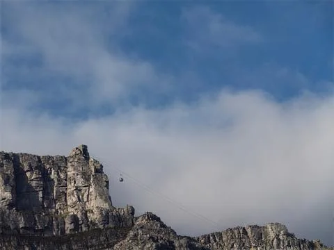 Table mountain cable car with a view towards the top cable way station, Cap.. Stock Photos