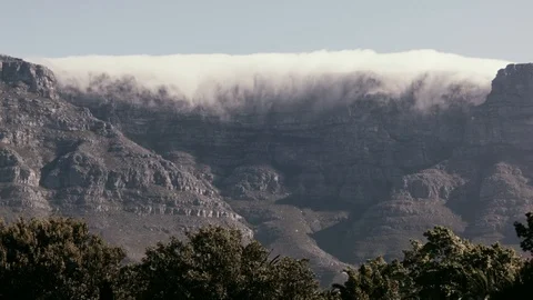 Table Mountain Cape Town With Clouds Going Over The Edge Stock Footage 104290411