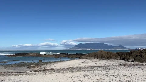 Table Mountain overlooking Table Bay rocky white sand beach Stock Footage 249177738
