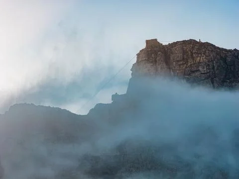 Table Mountain summit and cableway station in mist, Cape Town Stock Photos