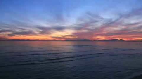 Table Mountain Sunset across False Bay from Strand Stock Footage 10729040