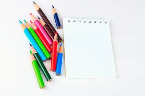 On the table is a notebook and pensil Stock-Fotos