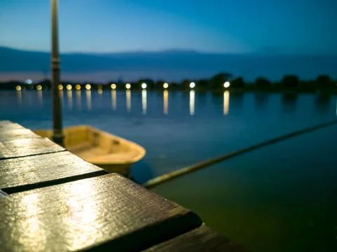 Table or balcony in front, blurred background are boats, ponds, Stock Photos