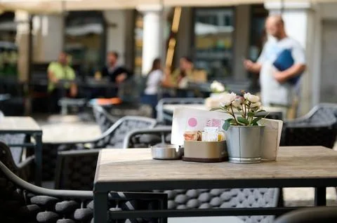 A table in outdoor cafe Stock Photos