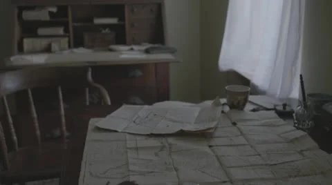 Table with papers and empty chair Stock-Footage 54282963