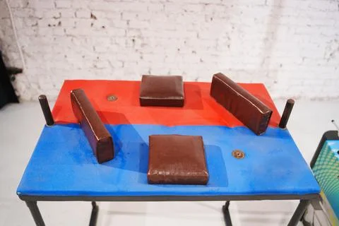 Table with patterned surface and foam blocks for activities or games Stock Photos