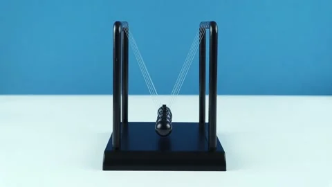Table Pendulum Balance Newton Balls Small On A Blue Background. Stock Footage 162254869