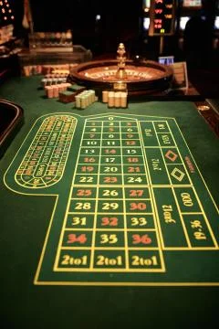 A table for playing roulette with chips Stock Photos
