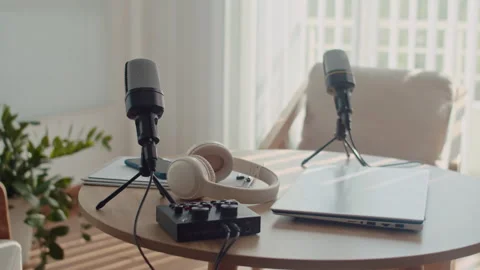 Table of Podcaster with Laptop, Audio Equipment and Microphone in Studio Stock Footage 254473423