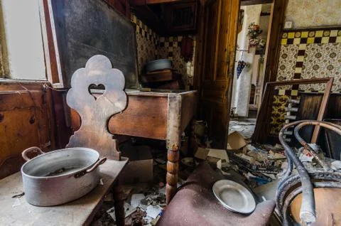 Table with pot in old kitchen in a house Stock Photos