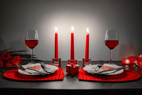 Table prepared for Valentines Day dinner at home Stock Photos
