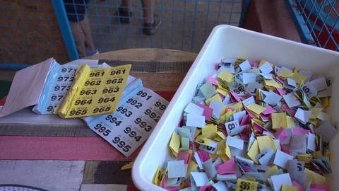 Table with raffle tickets and raffle she... | Stock Video | Pond5