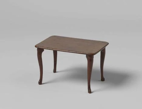 Table with rectangular leaf, on four s-shaped, overhoeks places placed. Re... Stock Photos