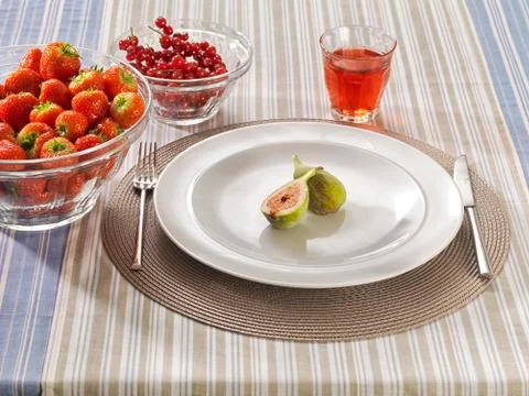 Table with red fruits 스톡 사진