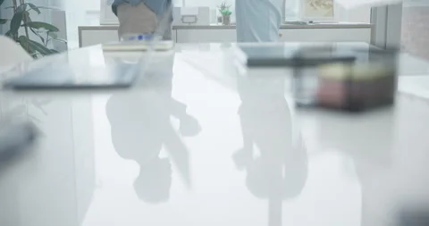 Table reflection, office and talking bus... | Stock Video | Pond5