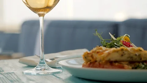 Table in restaurant. Dish with seafood salad, caviar, vegetables and greens Stock Footage 88306308
