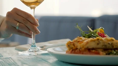 Table in restaurant. Dish with seafood salad, caviar, vegetables and greens Stock Footage 94453346