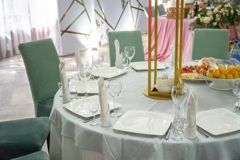 The table in the restaurant is served for dinner. Stock Photos