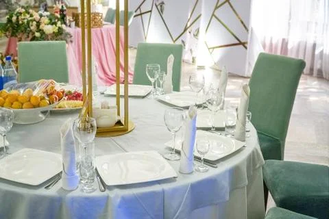 The table in the restaurant is served for dinner. Stock Photos