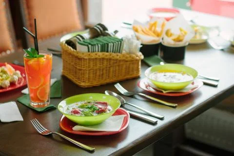 Table in a restaurant served for eating. Stock Photos