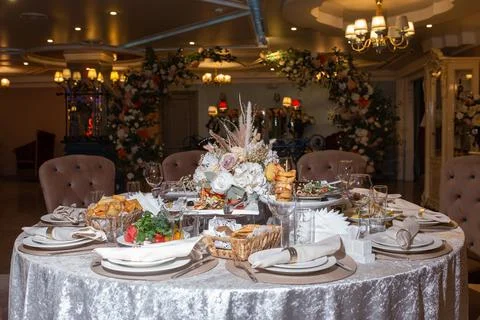 The table in the restaurant is served for a festive event Stock Photos