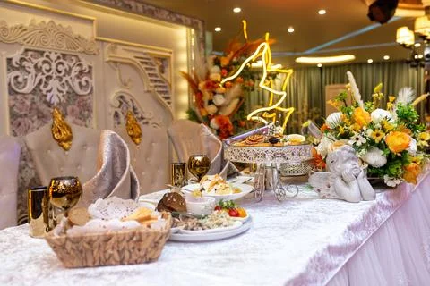 The table in the restaurant is served for a festive event Stock Photos