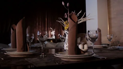 The table in the restaurant is waiting for visitors and served. Stock Footage 149819423