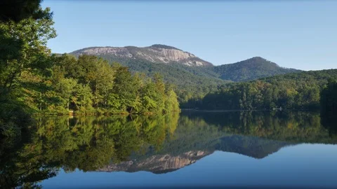 Table Rock Mountain Reflected in Pinnacle Lake on a Beautiful Day Stock Footage 96755551