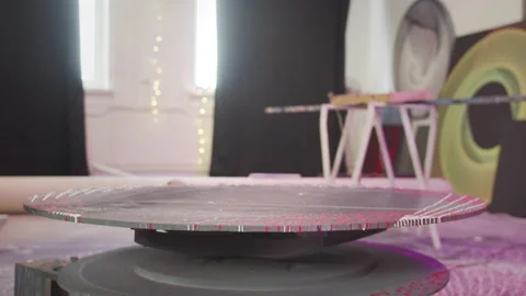 A table is rotating on its axis Stock Footage 156301706