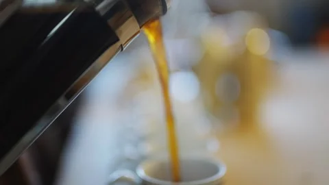 A table with a row of white cups and a row of milk bottles Stock Footage 295367167