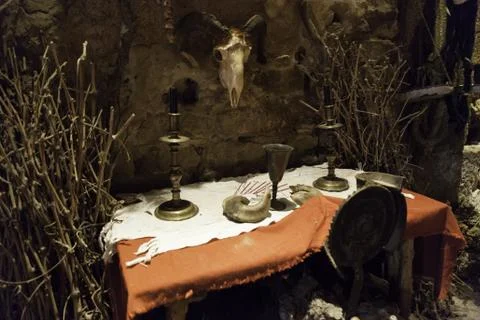 Table of satanic rites with potions, magic and mystery Stock Photos