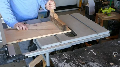 Table Saw Kickback While Cutting Wood on a Jobsite Saw Stock Footage 336552749