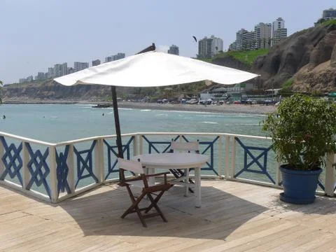 Table, seats and a table to see Miraflores Stock Photos