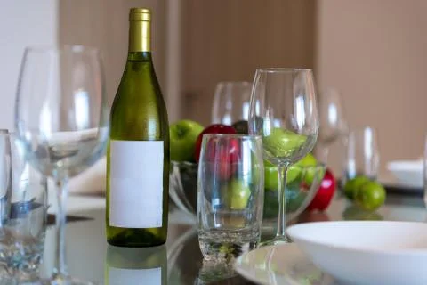 Table served for dinner with cutlery and fruit close-up. Stock Photos