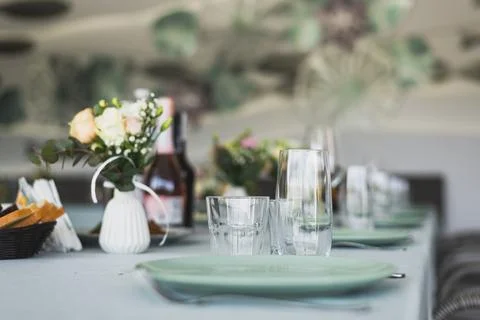 Table served in modern stylish dining room Stock Photos